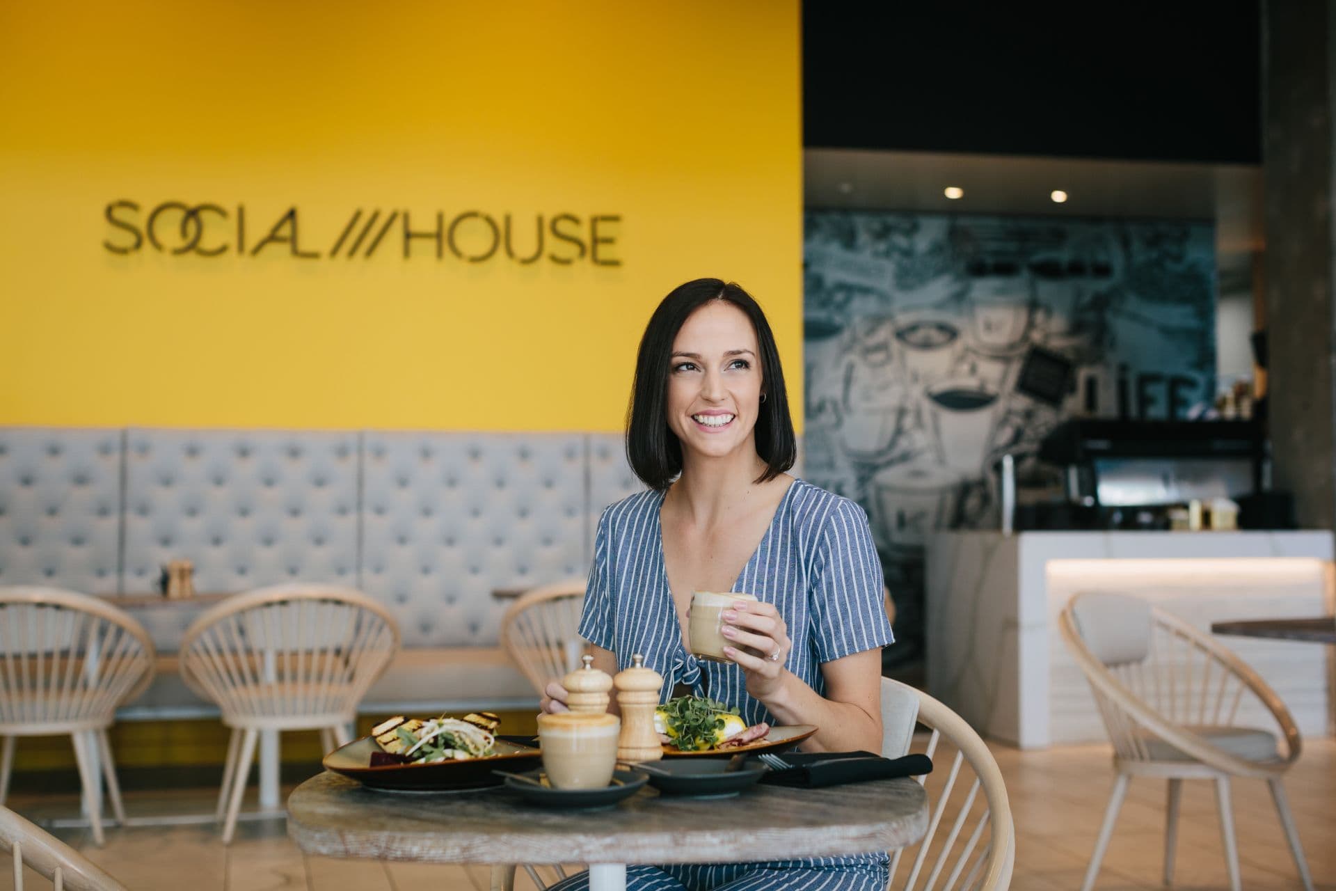 happy-woman-eating-breakfast